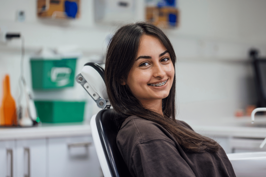 Patient with braces during orthodontic treatment planning in Gainesville, GA