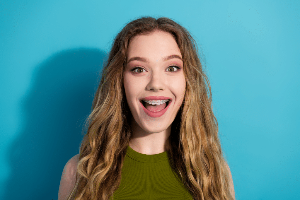 Teen smiling with braces for crossbite treatment in Gainesville GA